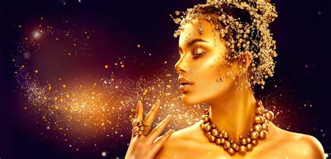 Gold Woman Skin Beauty Fashion Model Girl With Golden Makeup Stock