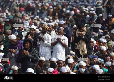 A Devotee C Yawns As He Prays Among Others During Final Prayers On
