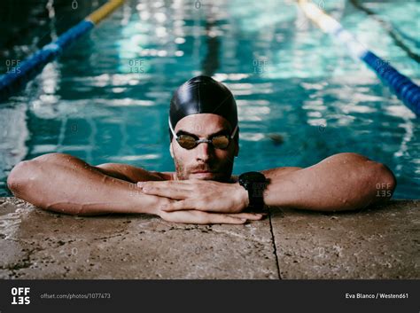 Professional Male Swimmer Leaning At Poolside Stock Photo Offset