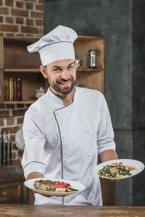Happy Male Chef In White Uniform Offering Delicious Dishes Tasty