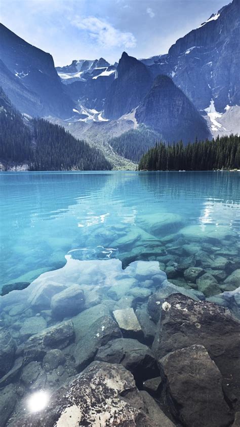 Nature Crystal Clear Water Of A Mountain Lake Calm And Peaceful With