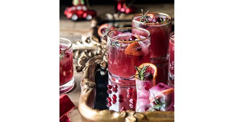 Cranberry bourbon the subtle tang of cranberry and the warm winter spices make this bourbon just right for holiday toasts—neat, on the rocks or in a cocktail. Holiday Cheermeister Bourbon Punch | Signature Wedding Drinks For Winter | POPSUGAR Food Photo 9