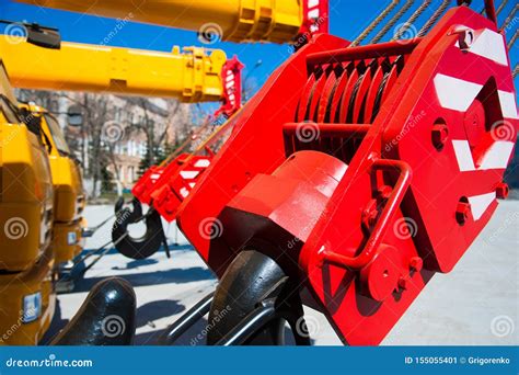 Mobile Construction Cranes With Yellow Telescopic Arms And Big Tower