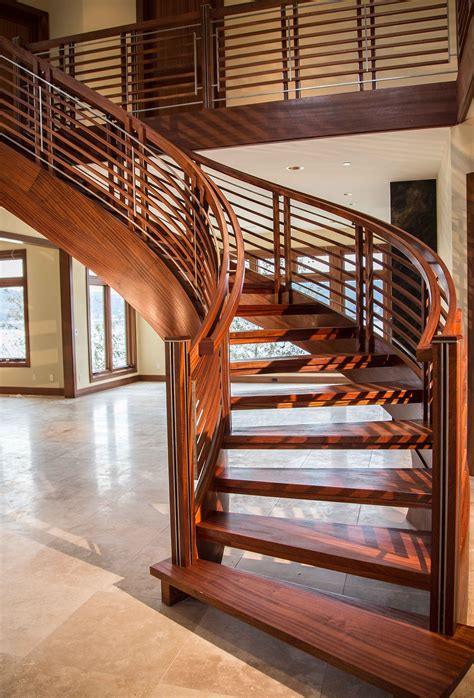 Modern Stair Design With Sapele And Inlayed Stainless Steel Modern