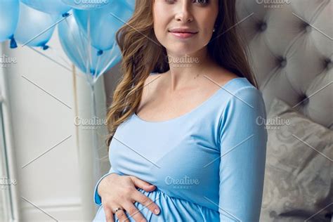 Pregnant Young Girl In Blue Dress Featuring Pregnant Beautiful And