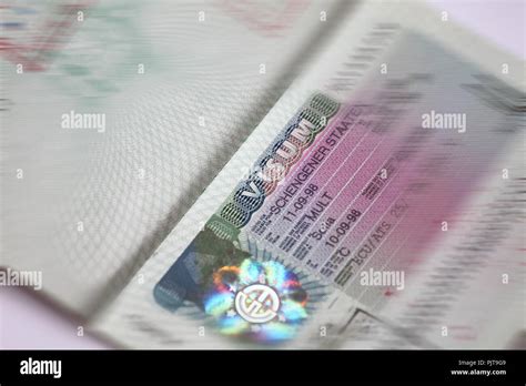 Schengen Visa Stamp In International Passport Shengen Document For