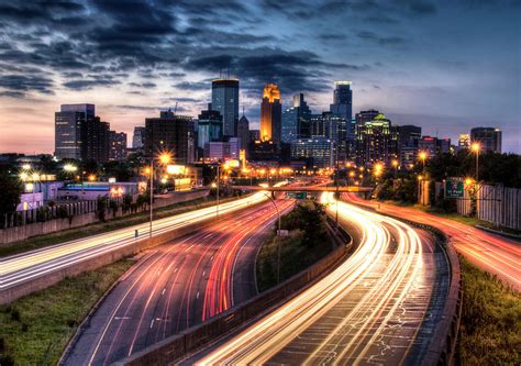 It lies at the head of navigation on the mississippi river, near the river's confluence with the minnesota river. Downtown Minneapolis Skyscrapers Photograph by Greg Benz