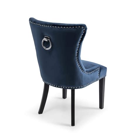 This dining chair will surely become a conversation piece. Dark Blue Brushed Velvet Dining Chair with Black Wooden ...
