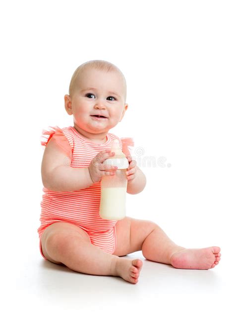 Baby Girl Drinking Milk From Bottle Stock Photo Image