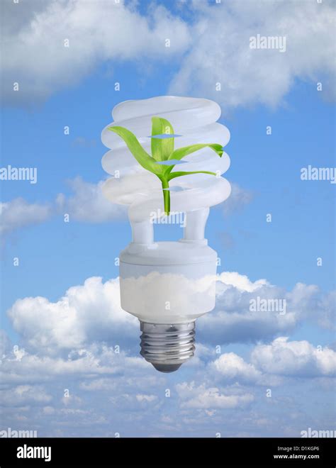 Compact Fluorescent Light Bulb Cfl Bulb Floating In Sky Stock Photo