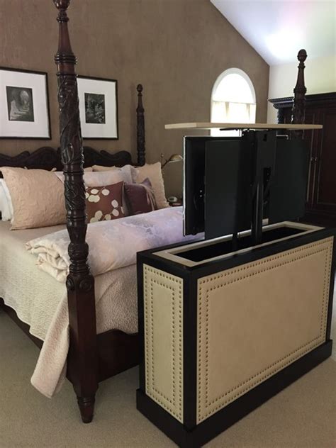 For when you don't have room for a tv cabinet and. end of bed leather studded TV lift cabinet by Cabinet ...