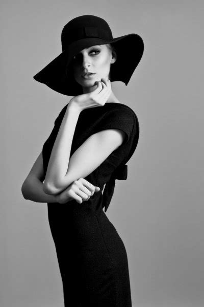 High Fashion Portrait Of Elegant Woman In Black And White Hat And Dress
