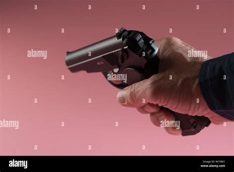 Male Hand With Gun Stock Photo Alamy