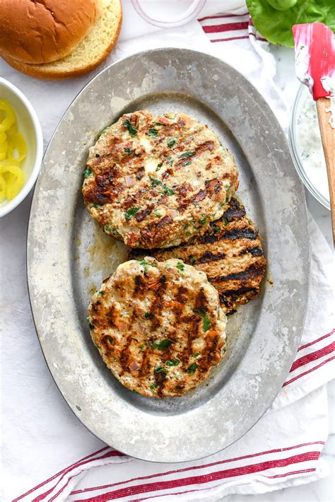 Put them on a bun and dress them up! Greek Turkey Burgers (+ Tzatziki Sauce!) | foodiecrush.com