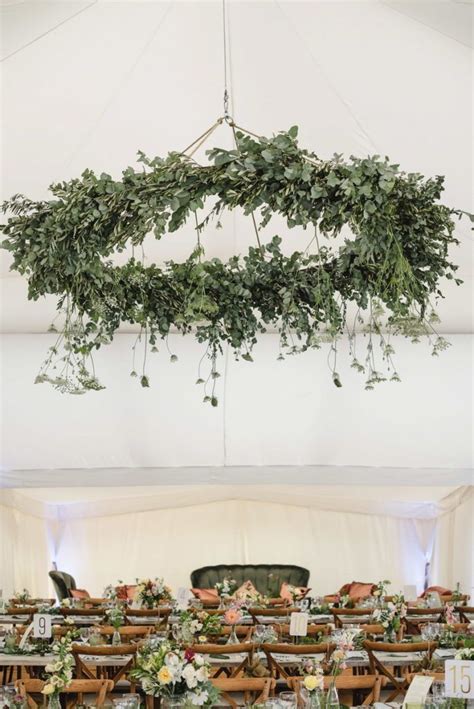 statement floral hoop wedding decor using foliage and greenery for a marquee wedding with