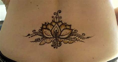 But, it is not enough to choose just any flower. Henna Mehndi tattoo designs idea for lower back - Tattoos ...