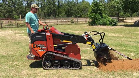 Ditch Witch Sk600 Mini Skid Steer With Sk5tr Trencher Attachment Youtube