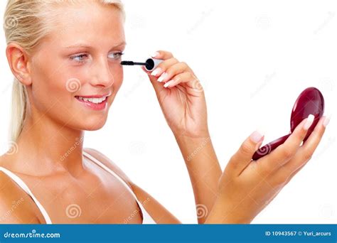 Young Girl Applying Mascara Against White Stock Image Image Of Lady
