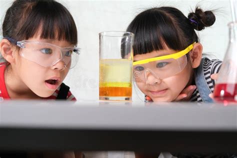 Children Are Learning And Doing Science Experiments In The Classroom