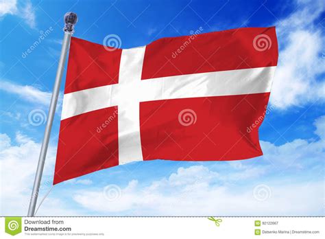 The vertical part of the cross is shifted to the hoist side. Flag Of Denmark Developing Against A Clear Blue Sky Stock Image - Image of overcast, symbol ...