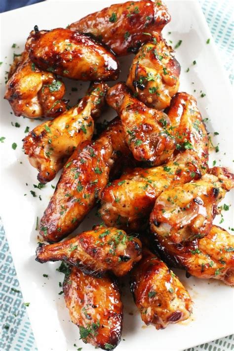 Heat a grill to medium heat and put the wings in one layer on the grate. Grilled Beer Marinated Chicken Wings - Cake 'n Knife