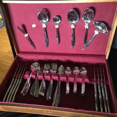 Lot 116 Two Sets Of Stainless Serving Ware With Cases