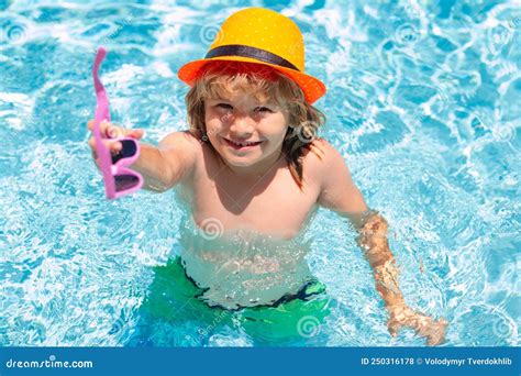 Child Splashing In Swimming Pool Swim Water Sport Activity On Summer