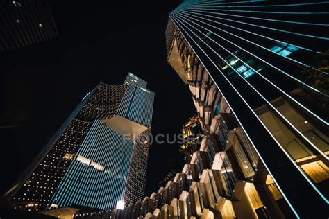 Contemporary Skyscrapers With Glass Walls In Evening Singapore