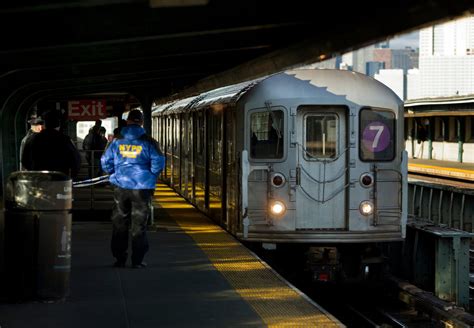 Woman Is Held In Death Of Man Pushed Onto Subway Tracks In Queens The