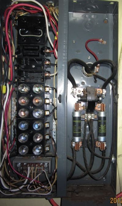 Without removing the internal panel safety cover, but by opening the hinged electrical panel. Tapping off fuse panel for subpanel - Electrician Talk ...