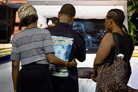 Photos At Alton Sterling Funeral Services Tears Hugs Among Crowd Of