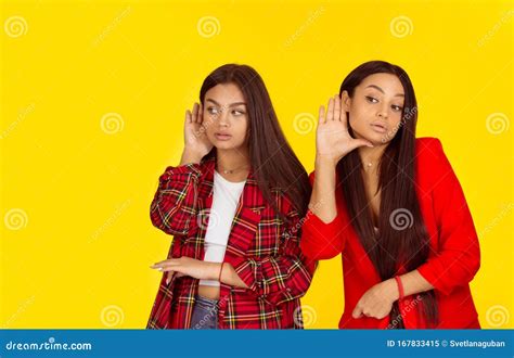 Young Nosy Women Hand To Ear Gesture Secretly Listening Stock Image