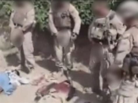 marine demoted for urinating on taliban corpse cbs news