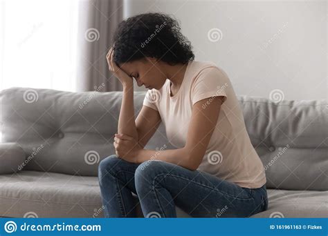 Stressed Black Woman Suffering From Depression At Home Stock Image