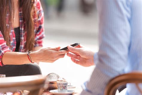 Exchanging Numbers During A Date Stock Photo Download Image Now Istock