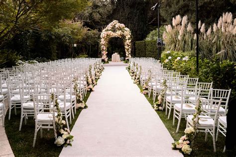 Beautiful Ceremony Structures Enveloped With Flowers