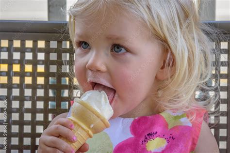 Babe Girl Licking Ice Cream Cone Stock Photo Adobe Stock