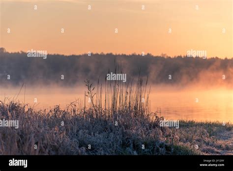Magical Sunrise Over A Lake Stock Photo Alamy