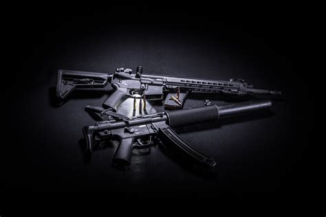 Two Black Assault Rifles K HD Others K Wallpapers Images Backgrounds Photos And Pictures