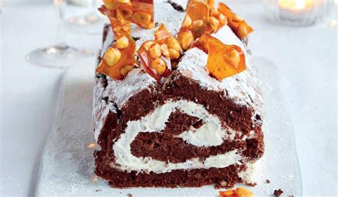In the swinging '60s she became the cookery editor of housewife magazine, followed by ideal home magazine. Mary Berry's Chocolate and Hazelnut Boozy Roulade | Recipe ...