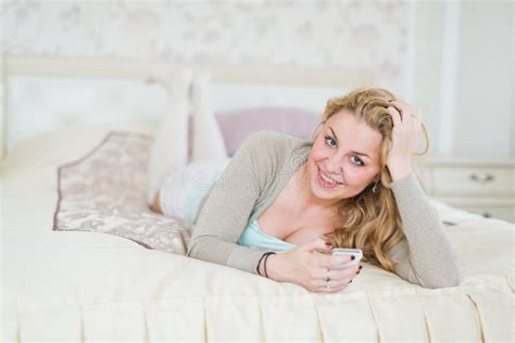 Pretty Happy Blonde Lying Bed Phoning Mobile Phone Stock Photos Free