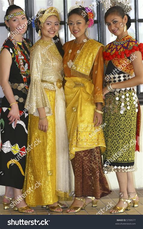 A Multi Ethnic Races In Malaysia Wearing Traditional Costumes Stock