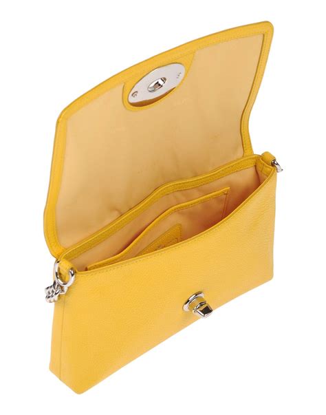 Coach Leather Cross Body Bag In Yellow Lyst