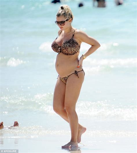 News Wet And Wild Pregnant Billie Faiers Shows Off Her Growing Baby Bump In Striking Leopard