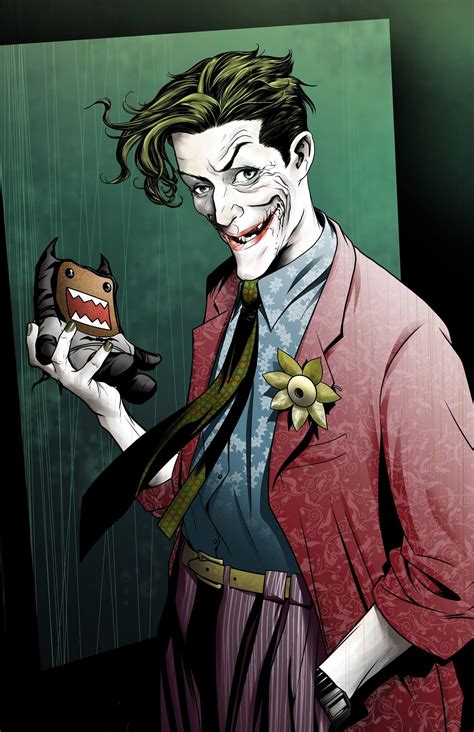 The Joker Is Holding A Toy In His Hand