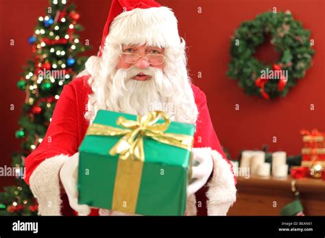 Santa Claus Giving T Stock Photo Alamy