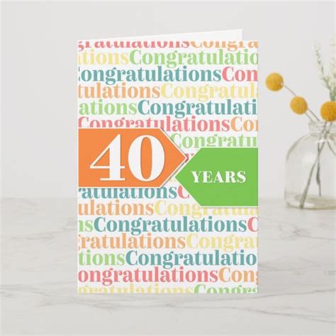 A Greeting Card With The Words 40 Years In Multicolored Letters And A