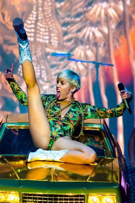 Miley Cyrus Leggy Wearing A Canabis Printed Leotard On Stage In Michigan Porn Pictures Xxx
