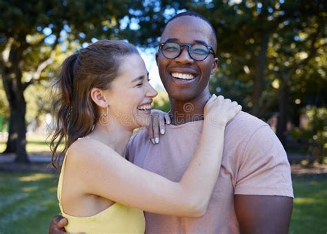 Summer Love And Laugh With An Interracial Couple Hugging Outdoor