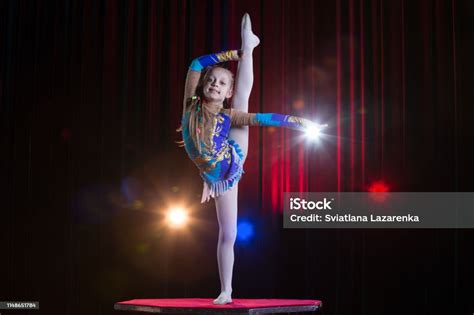 A Girl With A Flexible Body Performs A Circus Artist Circus Gymnast